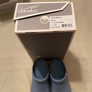 Dansko “Kane molded” I have black and yellow left the blue has been sold!!!